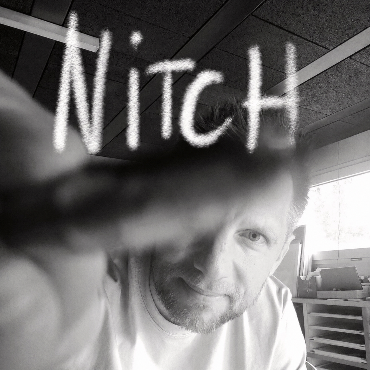 Black and white portrait of Nitch